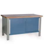 Closed workbench with blue cabinet and laminated hardwood top on a white background.