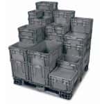 Several grey industrial straight wall containers stacked on top of each other on a pallet.